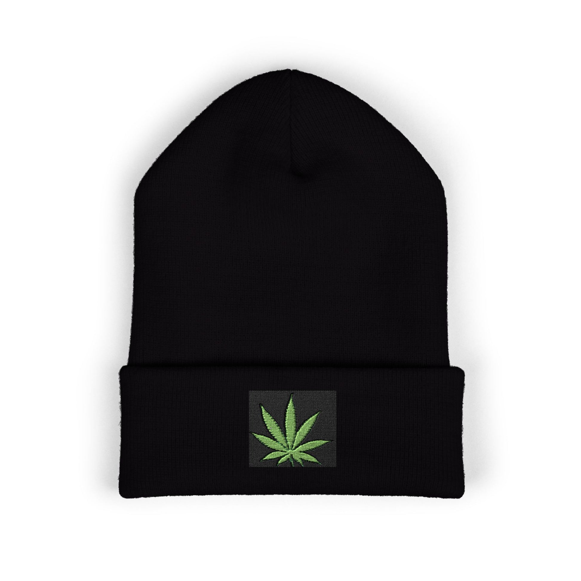 Black beanie with a green cannabis leaf patch.